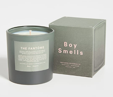 boy smells candle